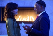 Carla Gugino accepts a token of appreciation from  Giancarlo Esposito in JETT for Cinemax